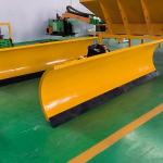 Máy xúc gắn lưỡi ủi tuyết